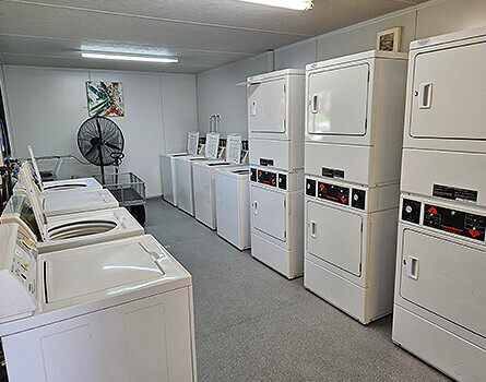 Large laundry room at Miles Crossroads with washing machines